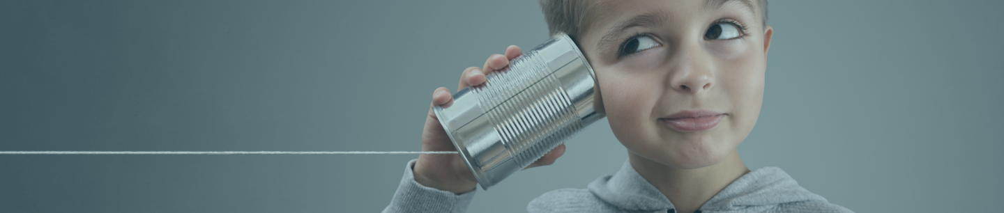 kid with tin can